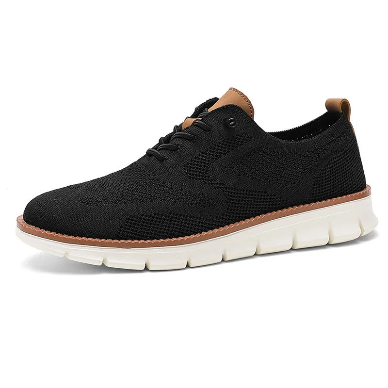 Black sneaker with brown accents on a white background