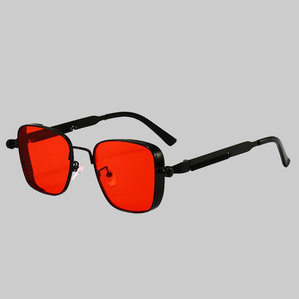 Sunglasses with red lenses and black frames on a white background