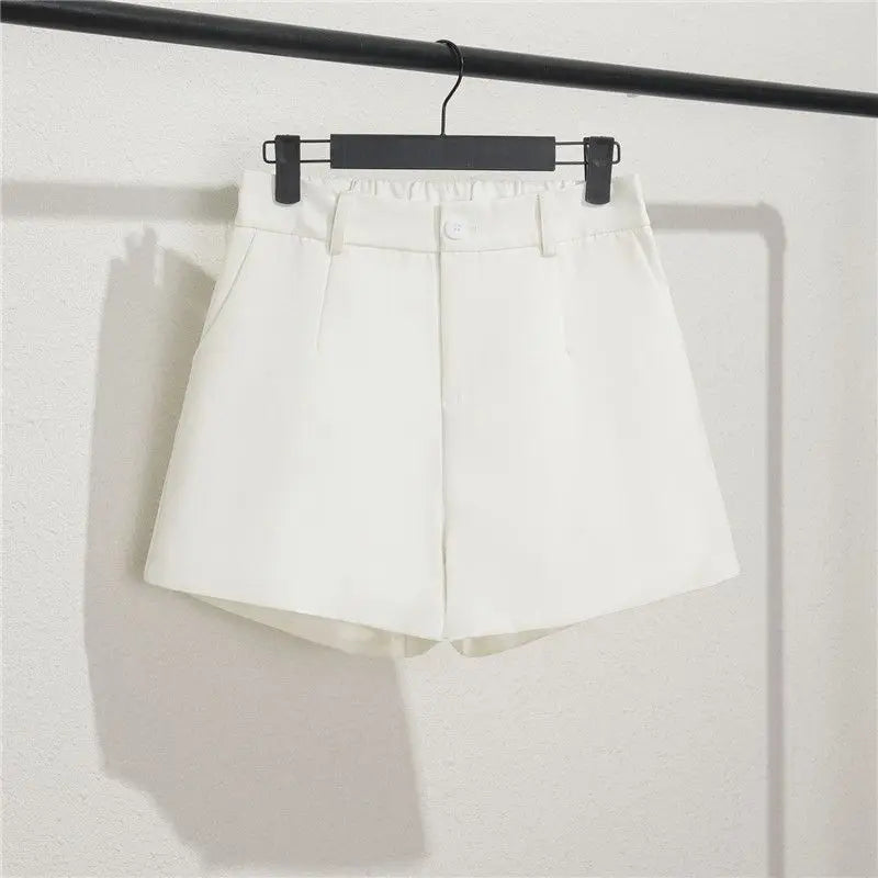 White skirt on a hanger against a white background