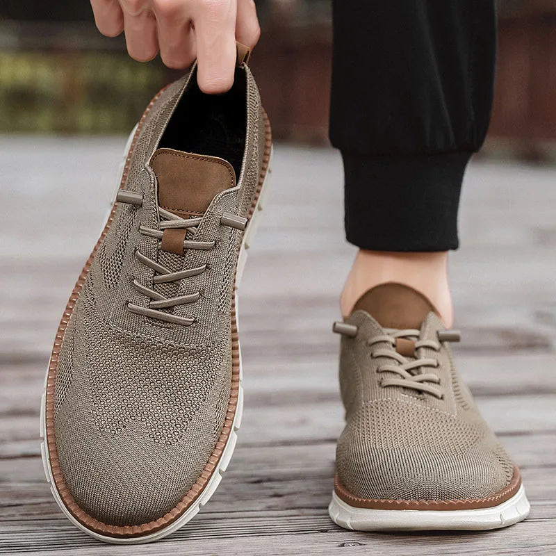 Brown leather shoes on a wooden floor