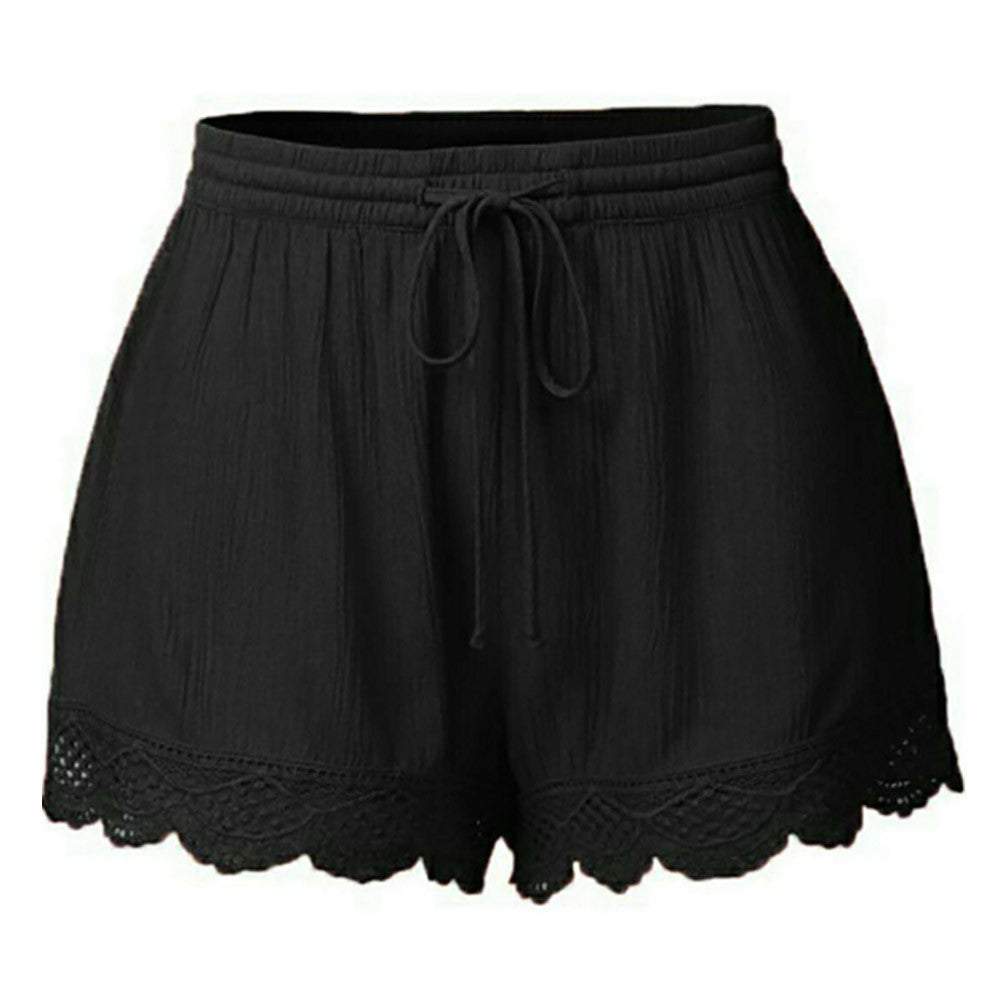 Black shorts with lace trim on a white background