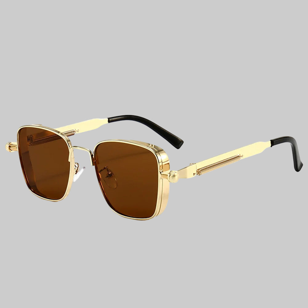 Gold-framed sunglasses with brown lenses on a white background