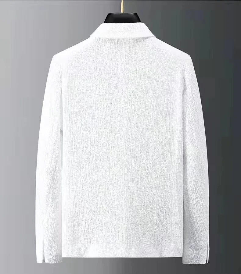 White textured shirt on a gray background