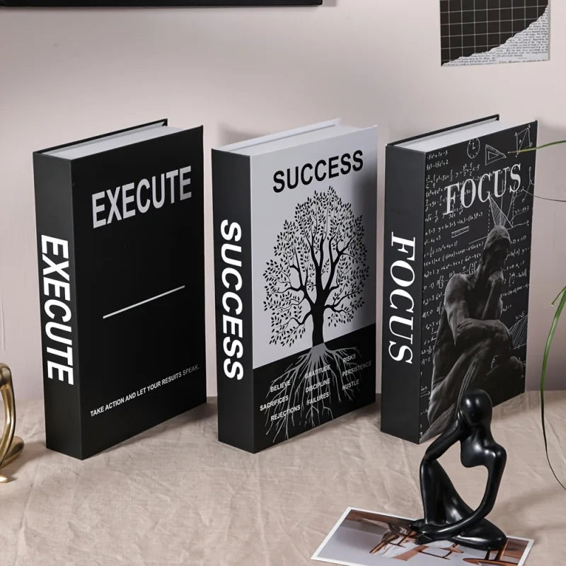 Three books titled 'Execute', 'Success', and 'Focus' on a surface with decorative items.