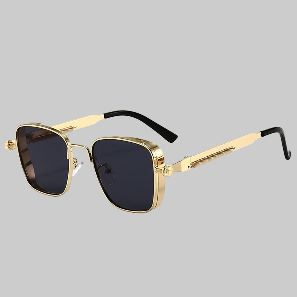 Gold-framed sunglasses with black lenses on a white background