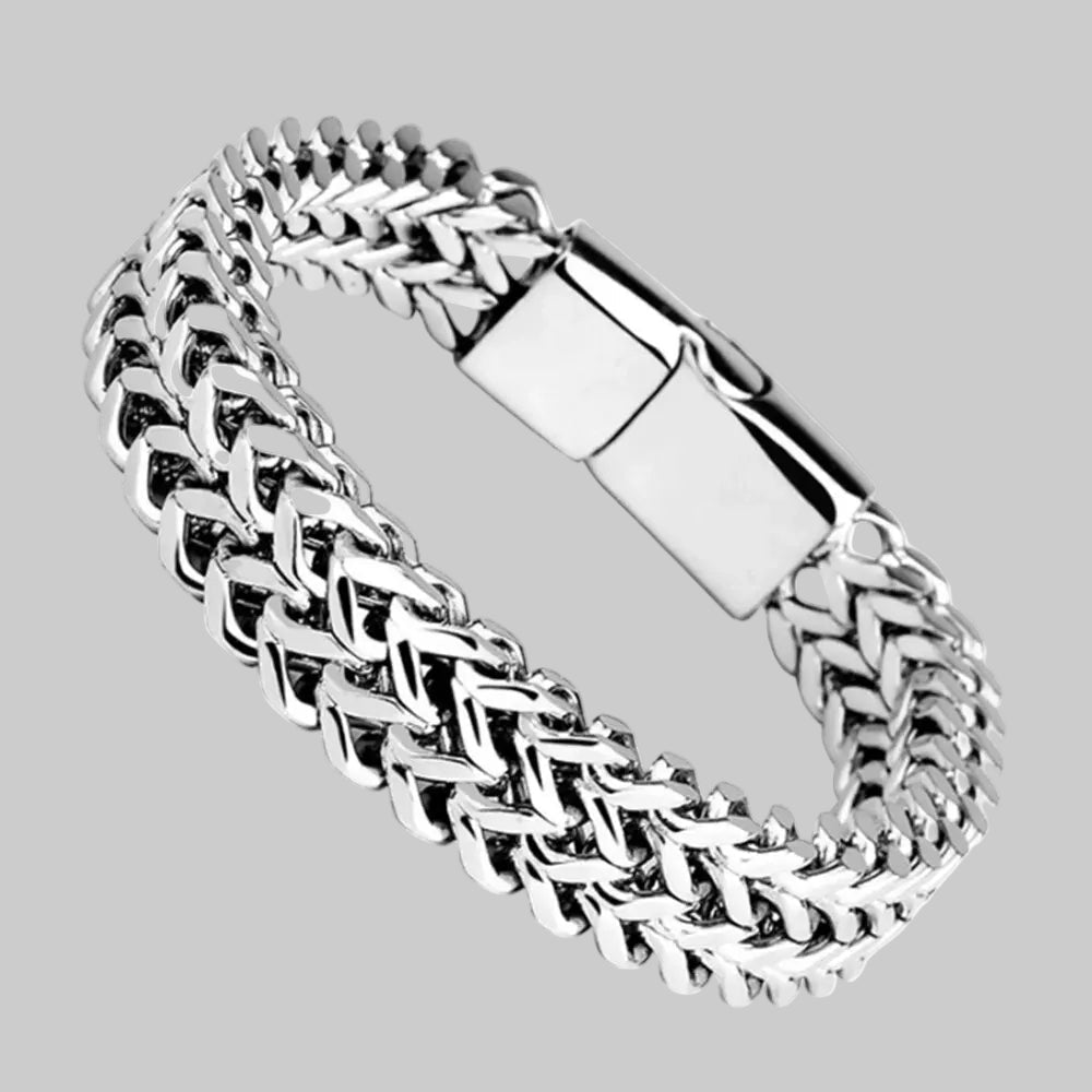 Silver chain bracelet with a magnetic clasp on a white background