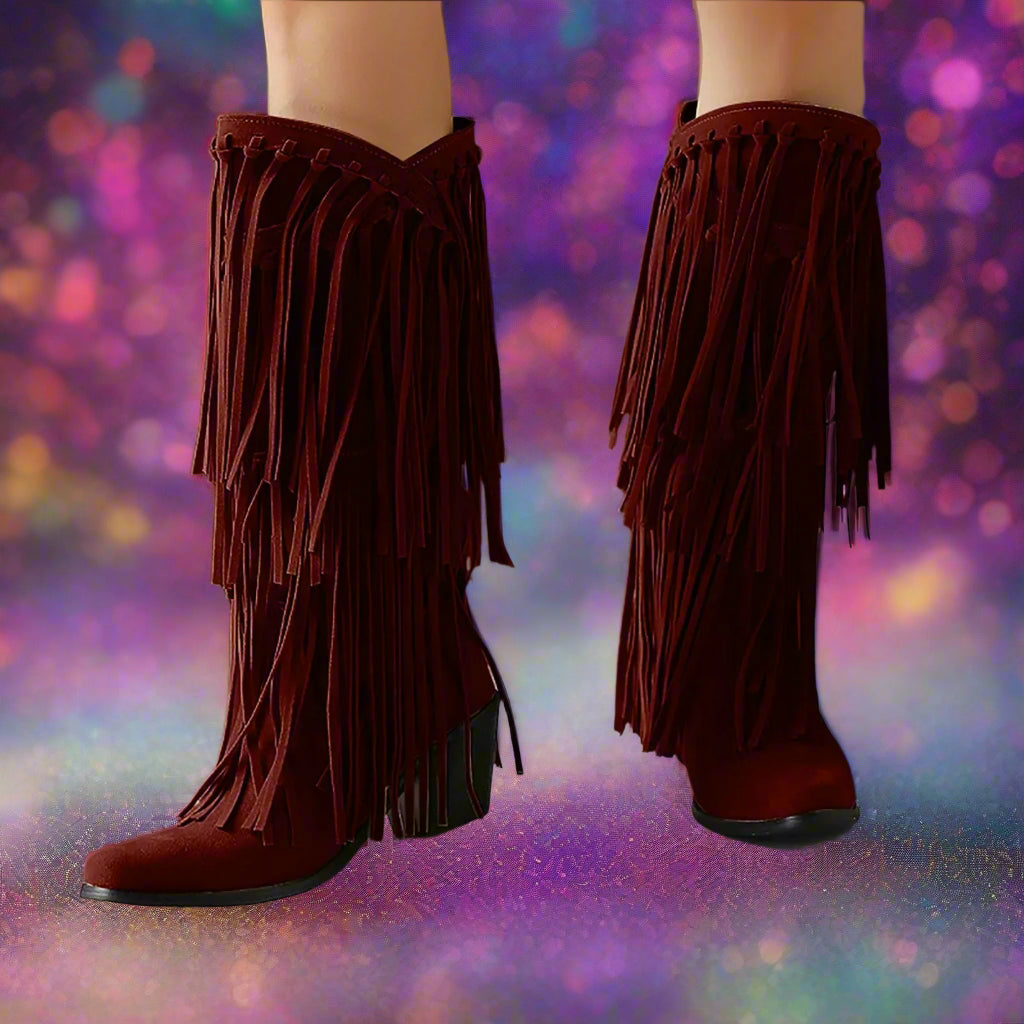 Red fringed boots on a neutral background