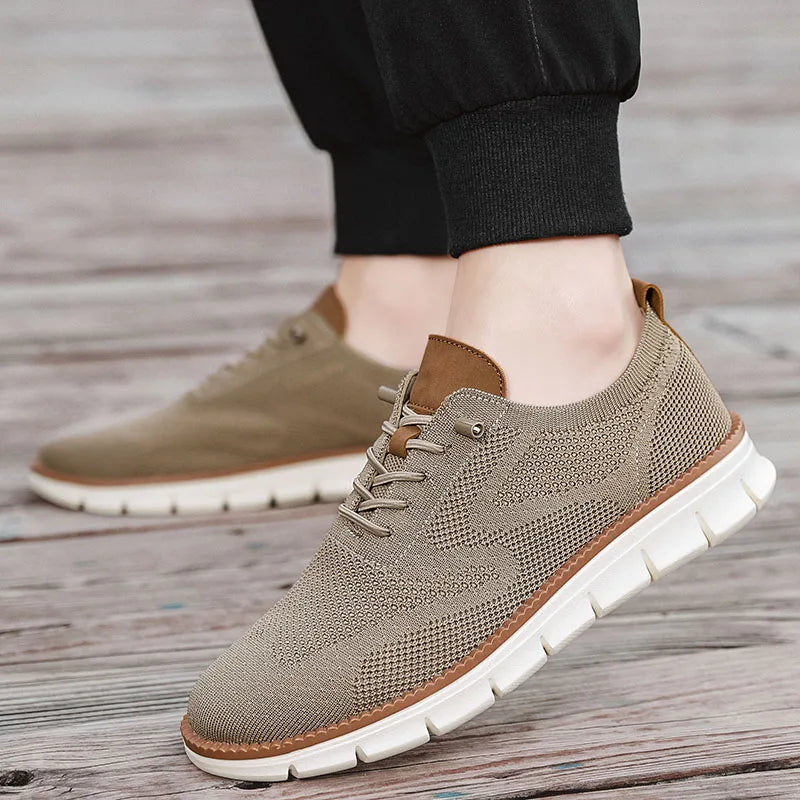 Brown casual shoes worn on a wooden floor