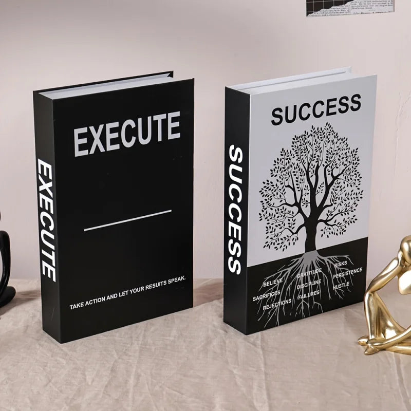Two books titled 'Execute' and 'Success' on a surface with a neutral background.