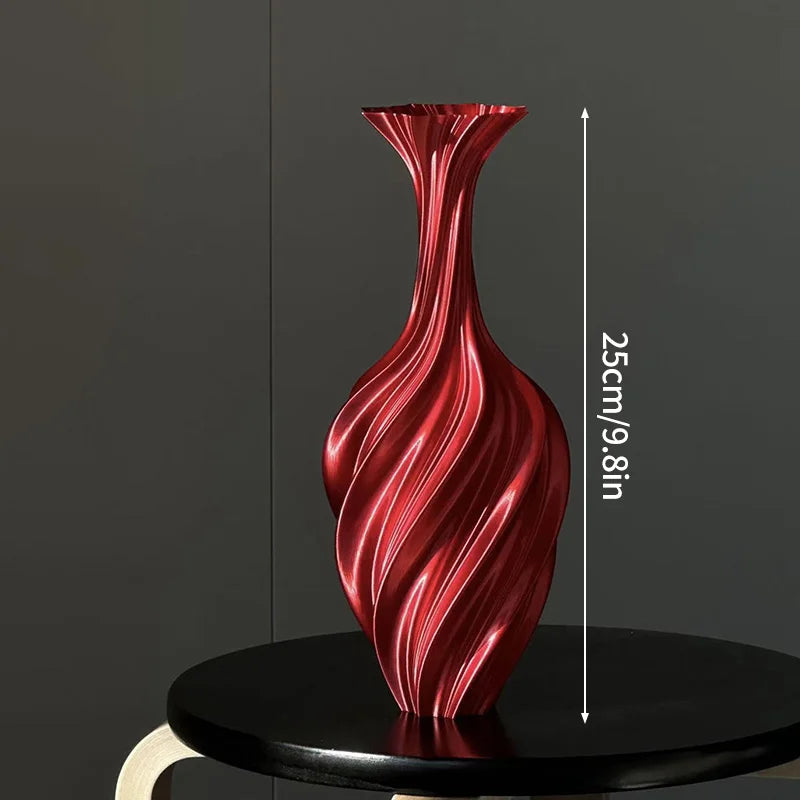 Red swirled vase on a black pedestal with height measurement against a dark background