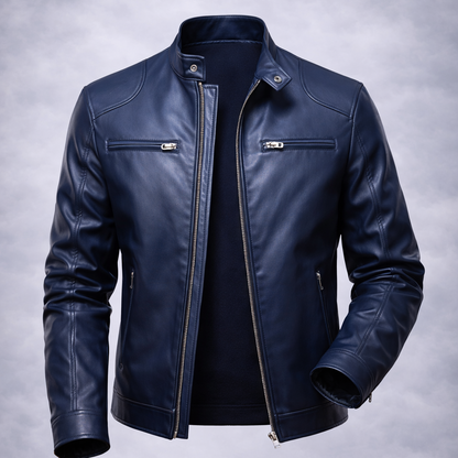 Blue leather jacket on a wooden surface with a gray background