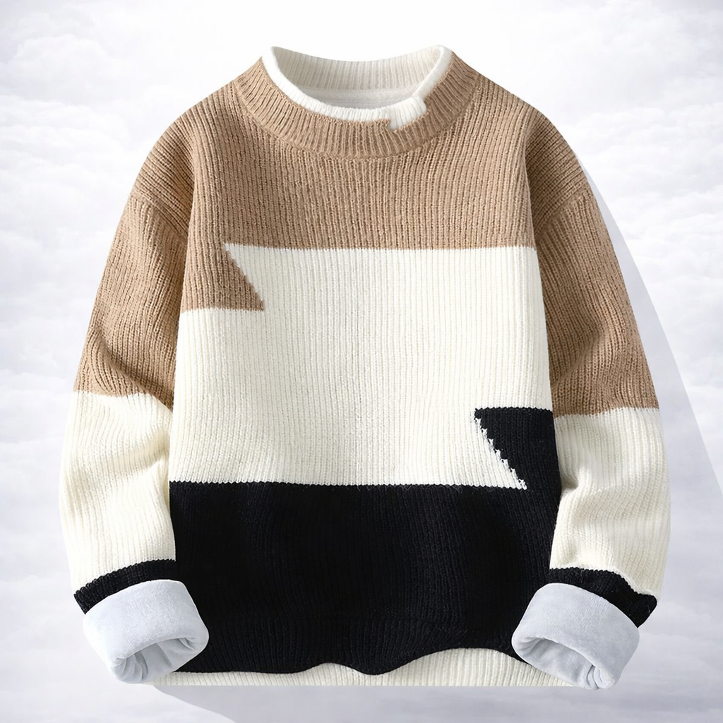 Color-blocked sweater with brown, white, and black sections on a light gray background
