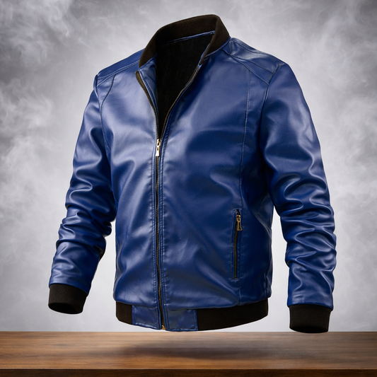 Blue leather jacket on a wooden surface with a gray background