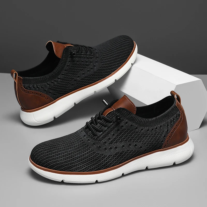 Black and brown sneakers with white soles on a gray background