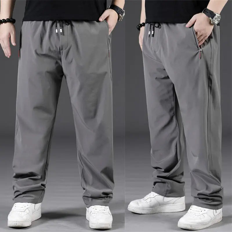 Gray pants worn by a person on a gray background