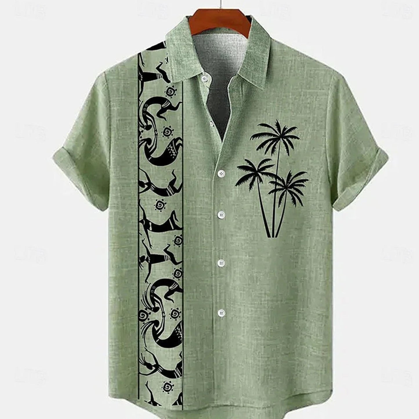 Green shirt with black palm tree design on a hanger against a white background