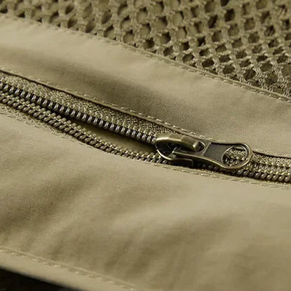 Close-up of a green zippered bag with text on a white background