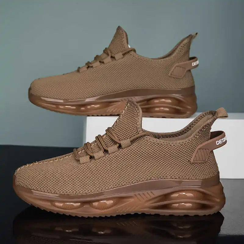 Brown athletic shoes on a reflective surface with a gradient background