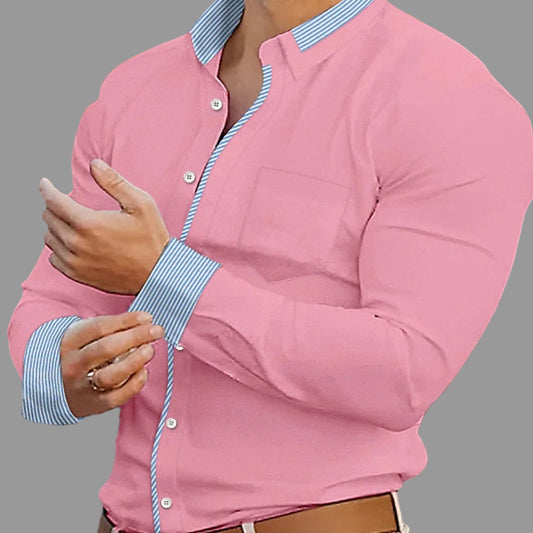 Person wearing a pink jacket with a blurred indoor background
