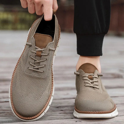 Brown leather shoes on a wooden floor