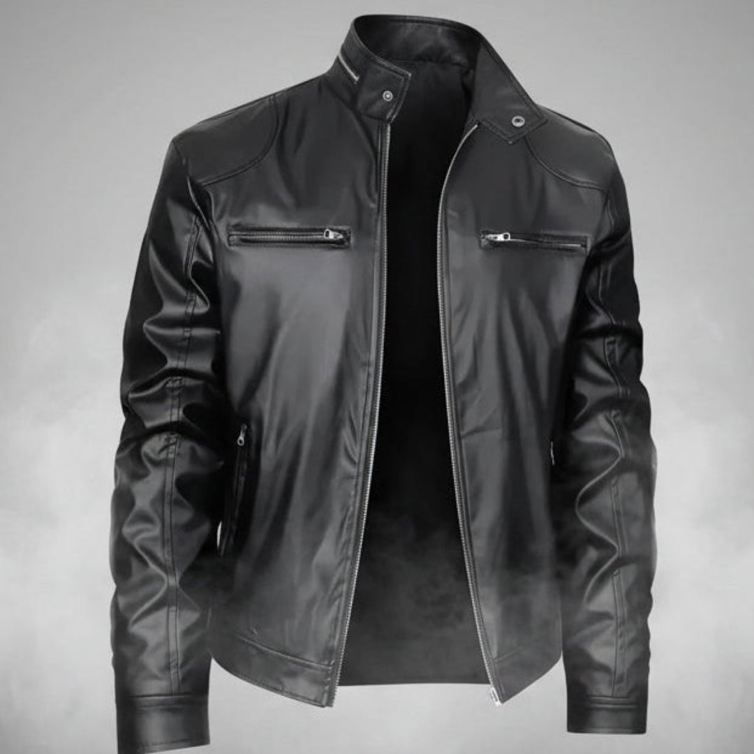 Black leather jacket on a gray background