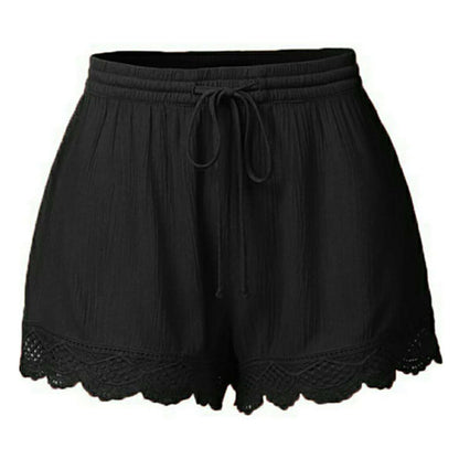 Black shorts with lace trim on a white background