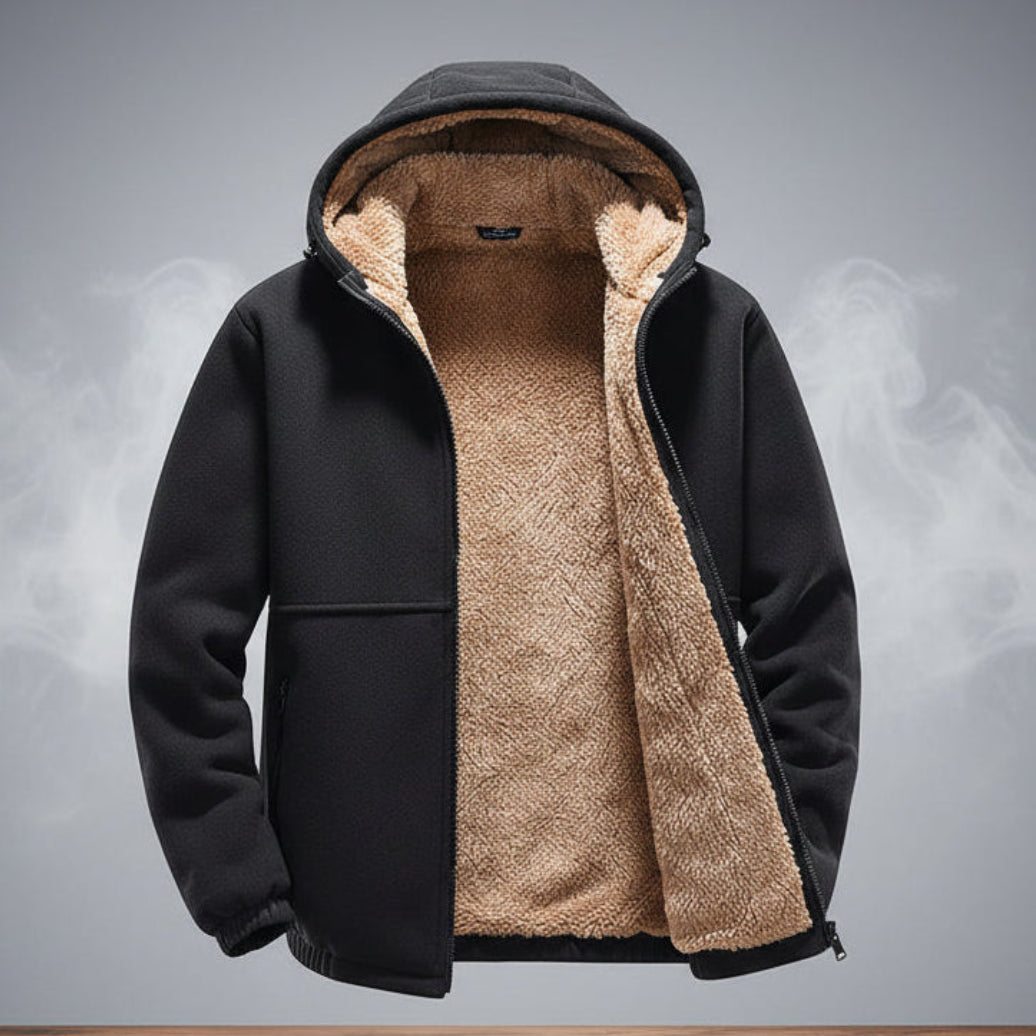 Black jacket with beige fleece lining on a gray background