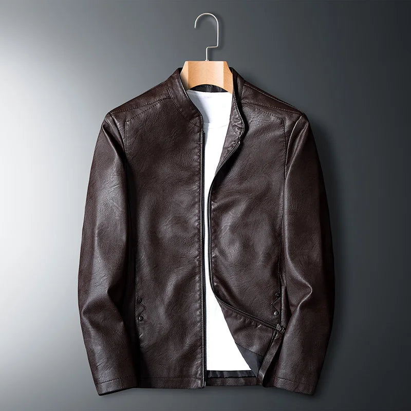 Brown leather jacket on a hanger against a gradient gray background