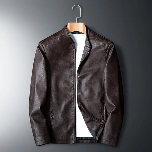 Brown leather jacket on a hanger against a gradient gray background