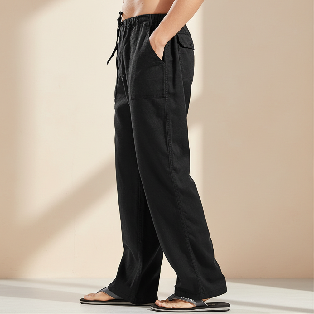 Black pants with drawstring waist on a white background