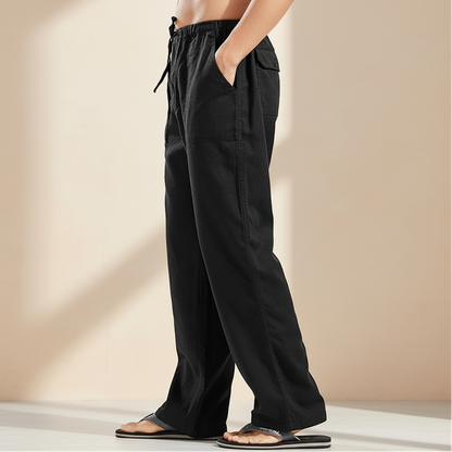 Black pants with drawstring waist on a white background