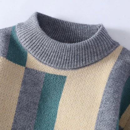 Close-up of a sweater with a patterned design on a light background