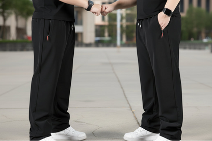 Two views of black pants worn by a person on a gray background