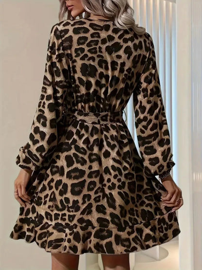Leopard print dress worn by a person indoors.