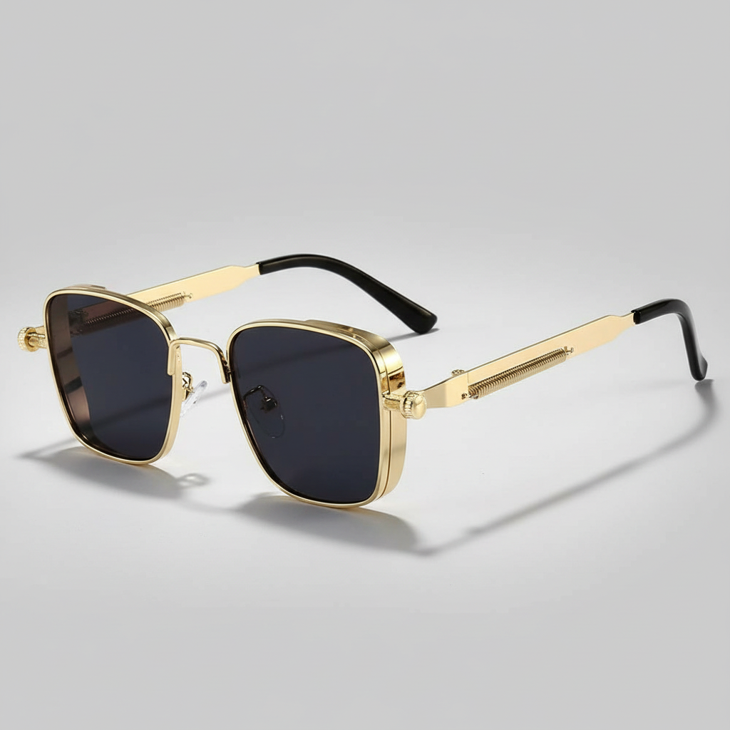 Gold-framed sunglasses with black lenses on a light gray background