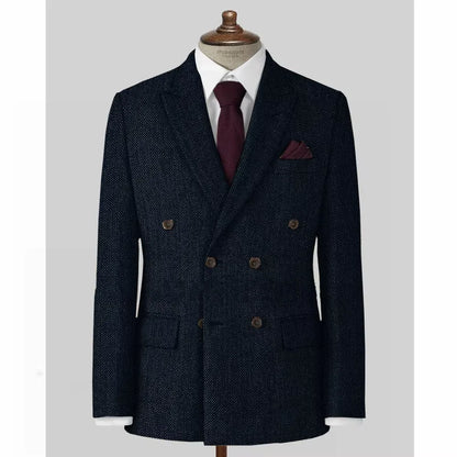 Navy Blue double-breasted suit jacket with a red tie and pocket square on a mannequin against a light gray background.