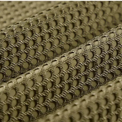 Close-up of green mesh fabric with 'Leisure' text in the corner