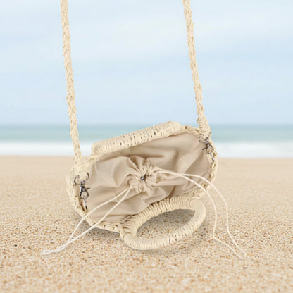 Woven handbag with a drawstring on a striped background