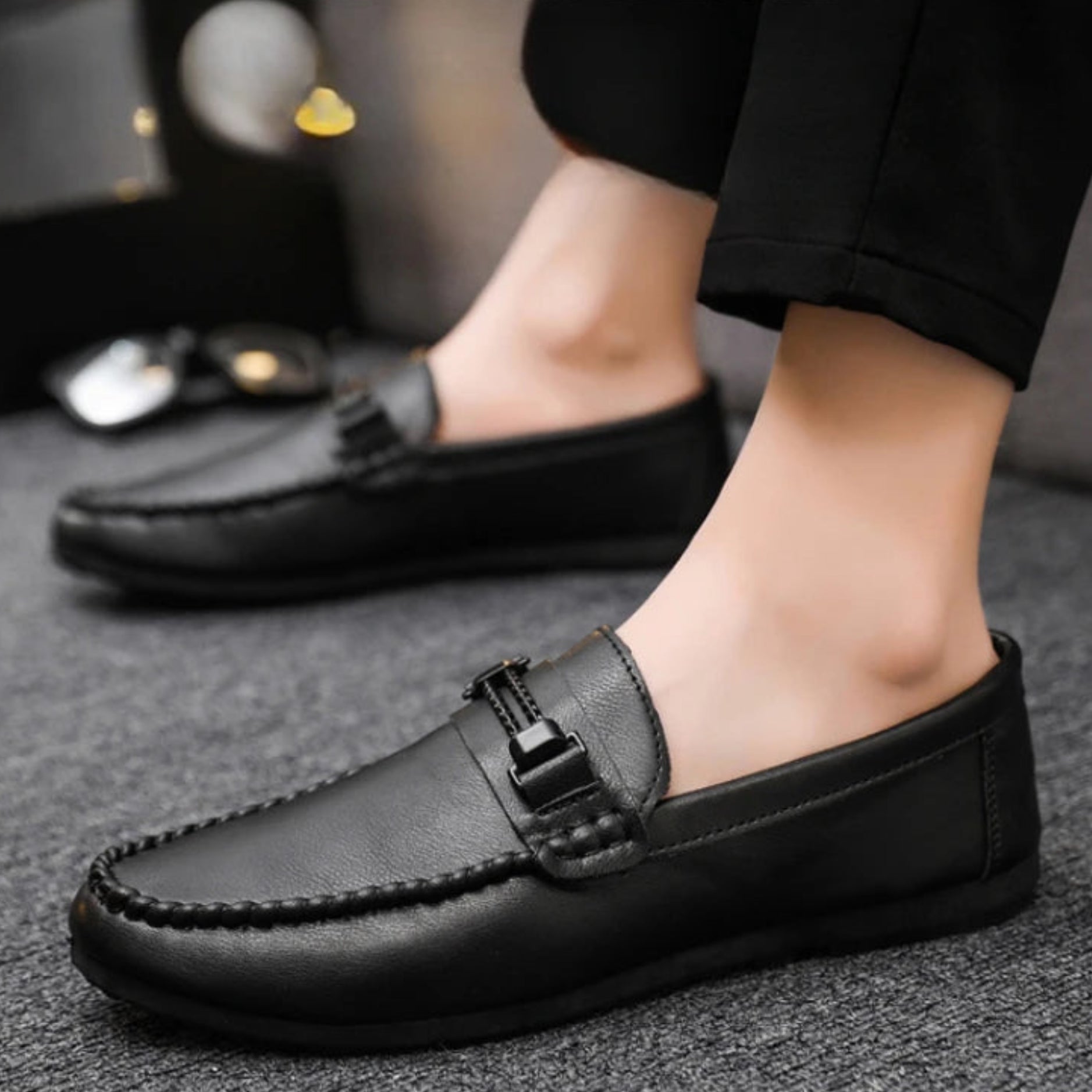 Black loafers worn by a person on a gray floor with 'SELF-CONFIDENCE' text above.