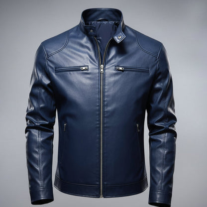Blue leather jacket on a wooden surface with a gray background