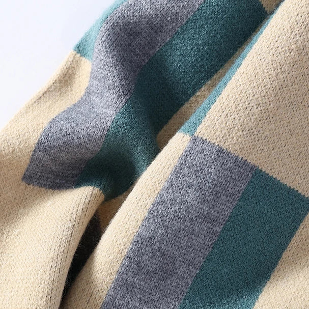 Close-up of a checkered fabric with blue and beige colors on a light background