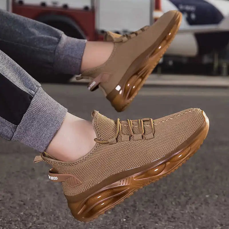 Brown sneakers worn on a person's feet with a blurred background