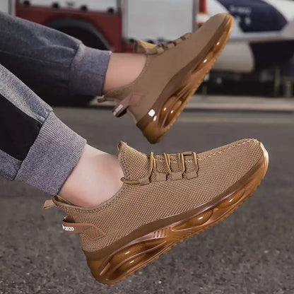 Brown sneakers worn on a person's feet with a blurred background