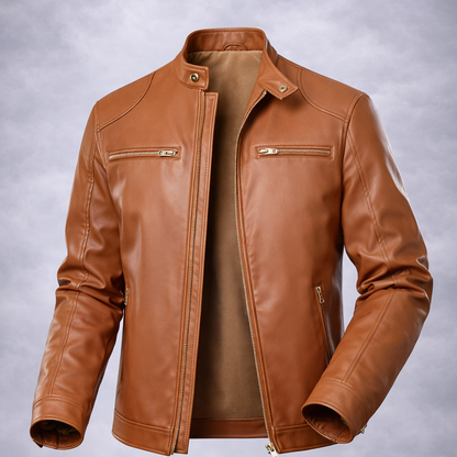 Brown leather jacket on a wooden surface with a gray background