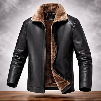 Black leather jacket with brown fur lining on a wooden surface and gray background